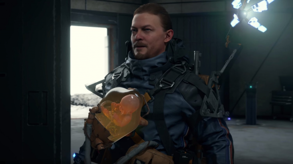 Death Stranding Sam and BB Death Stranding Sam Porter Bridges carrying his bridge baby (BB)