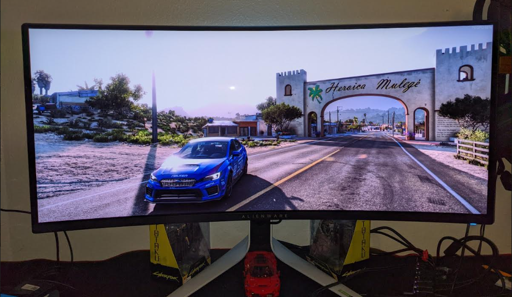 Subaru Shining in HDR on OLED Blue Subaru in front of Mexican town Forza Horizon on Alienware OLED Monitor