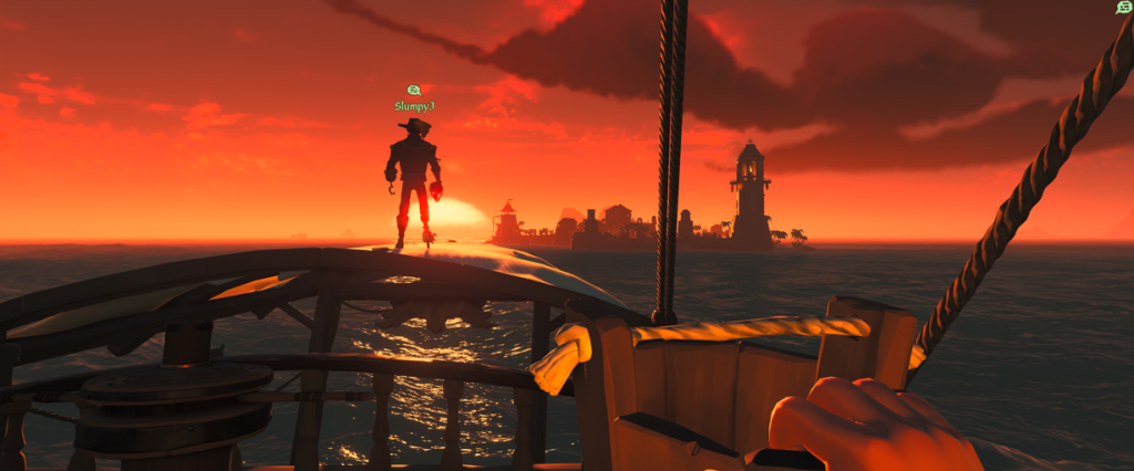 Sunsetting Over the Sea of Thieves Sea of Thieves watching the sunset from our sloop with my son standing watch and outpost in the distance