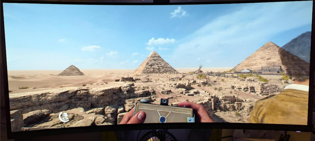 Pyramids of Giza Indiana Jones with camera in hand looking at the Pyramids in Giza