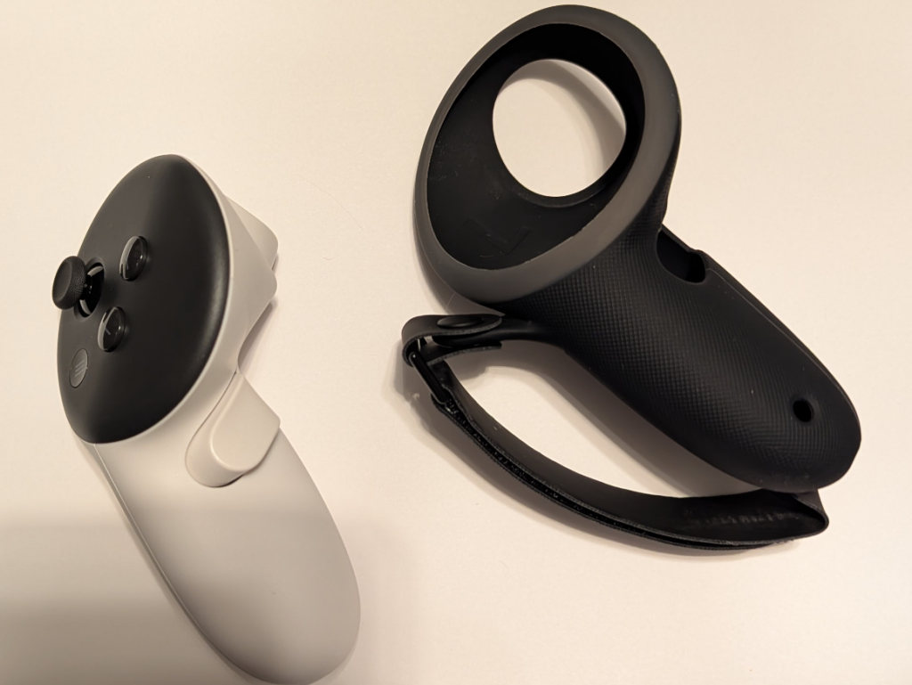 New Quest 3 Grips Kiwi Quest 3 black silicone grip in valve index style next to a Quest 3 controller